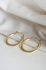 Mini Croissant Hoops – 10k Gold