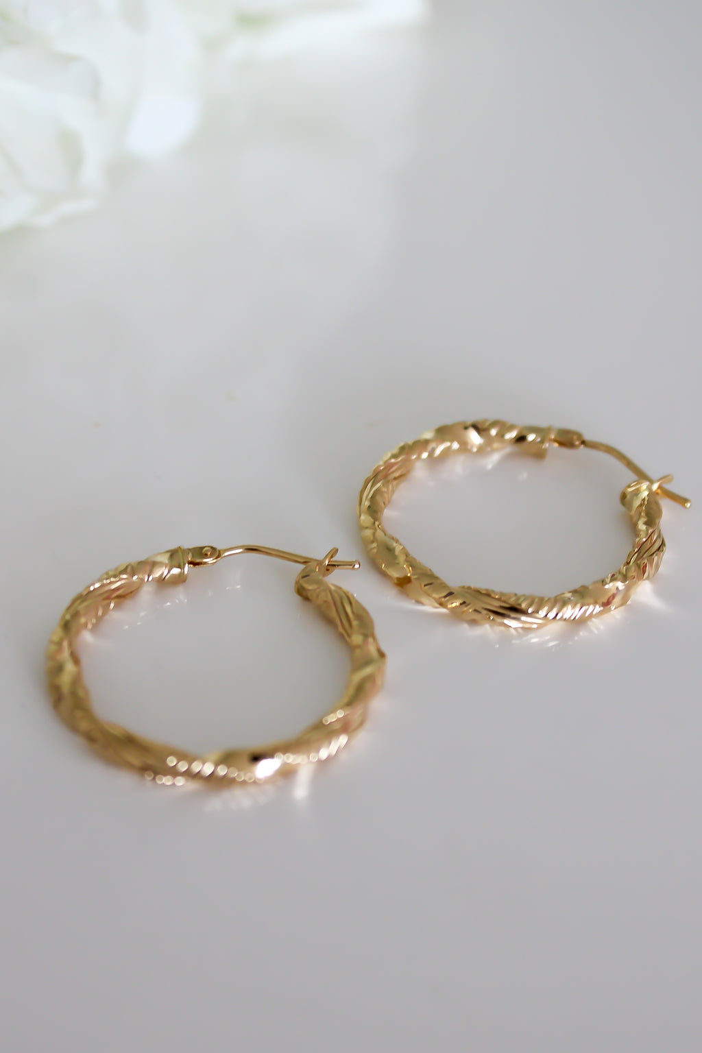 "Twisted Hoops – 10k Gold"