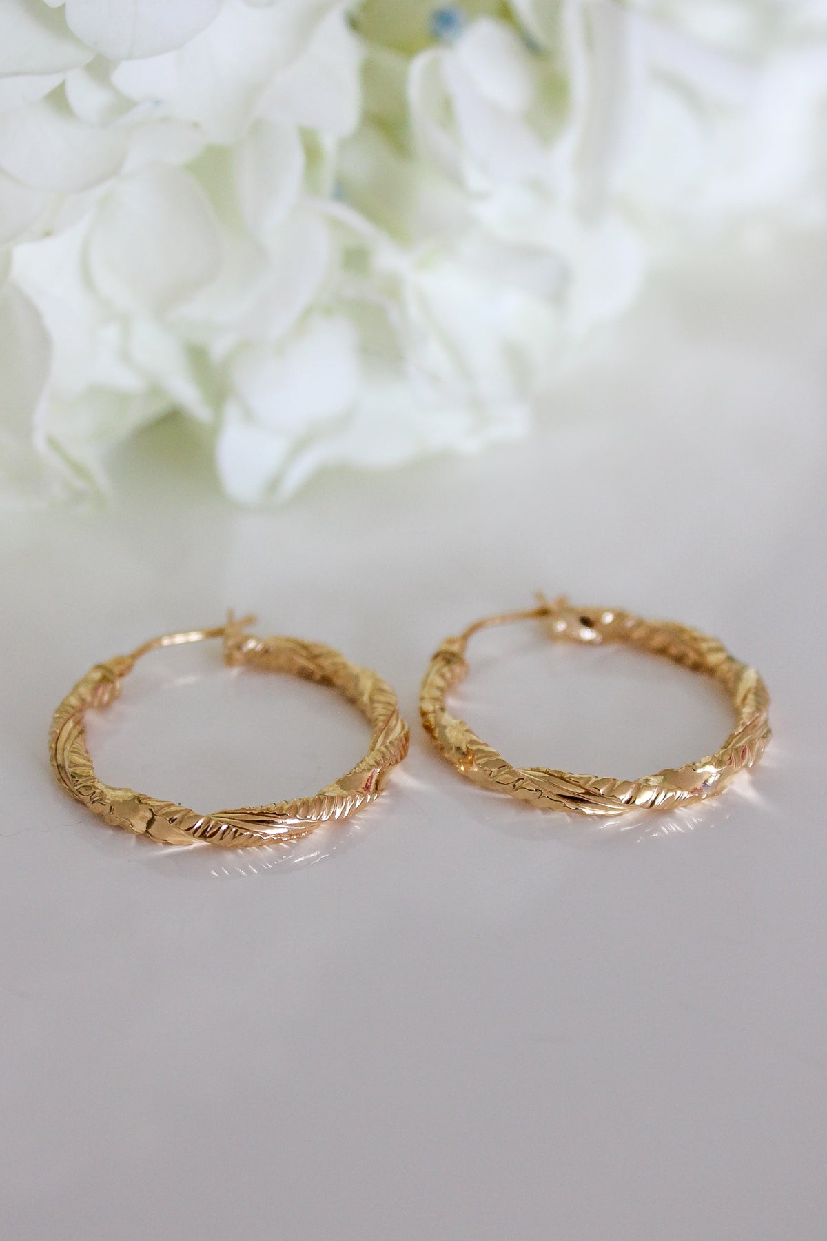 "Twisted Hoops – 10k Gold"