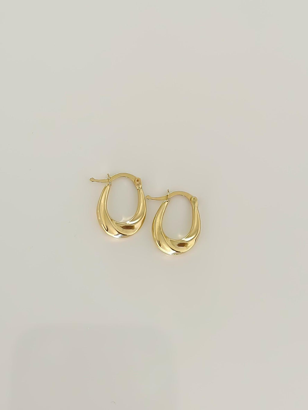 “Twisted Oval Hoops” – 10k or 14k Solid Gold